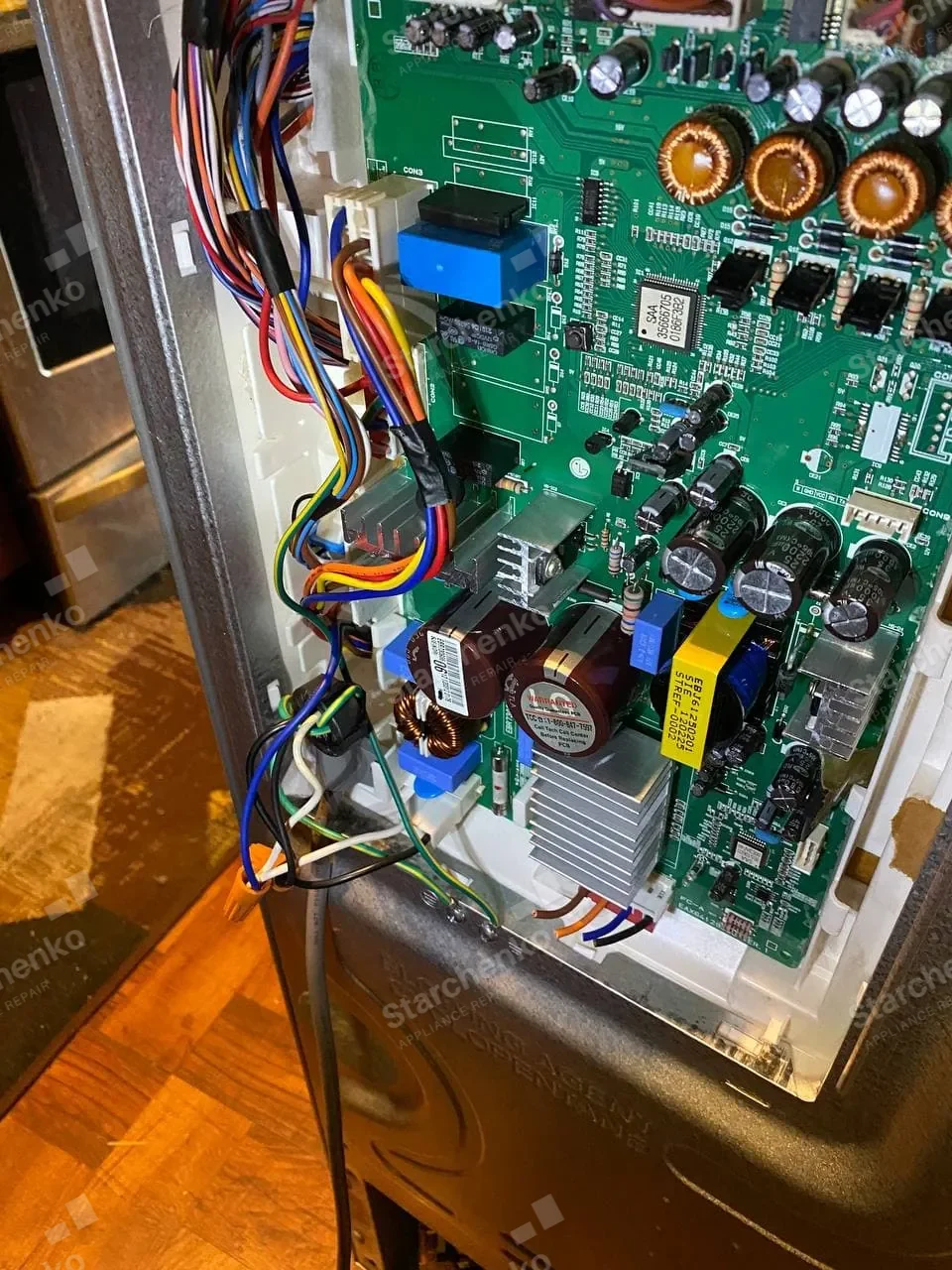 LG refrigerator main control board with the wiring harness connected